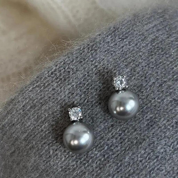 Elegante Ohrringe aus schwarzer Perle mit Brillanten