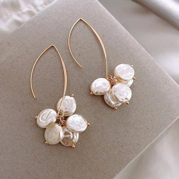 Elegante Ohrringe mit Perle und Kristall