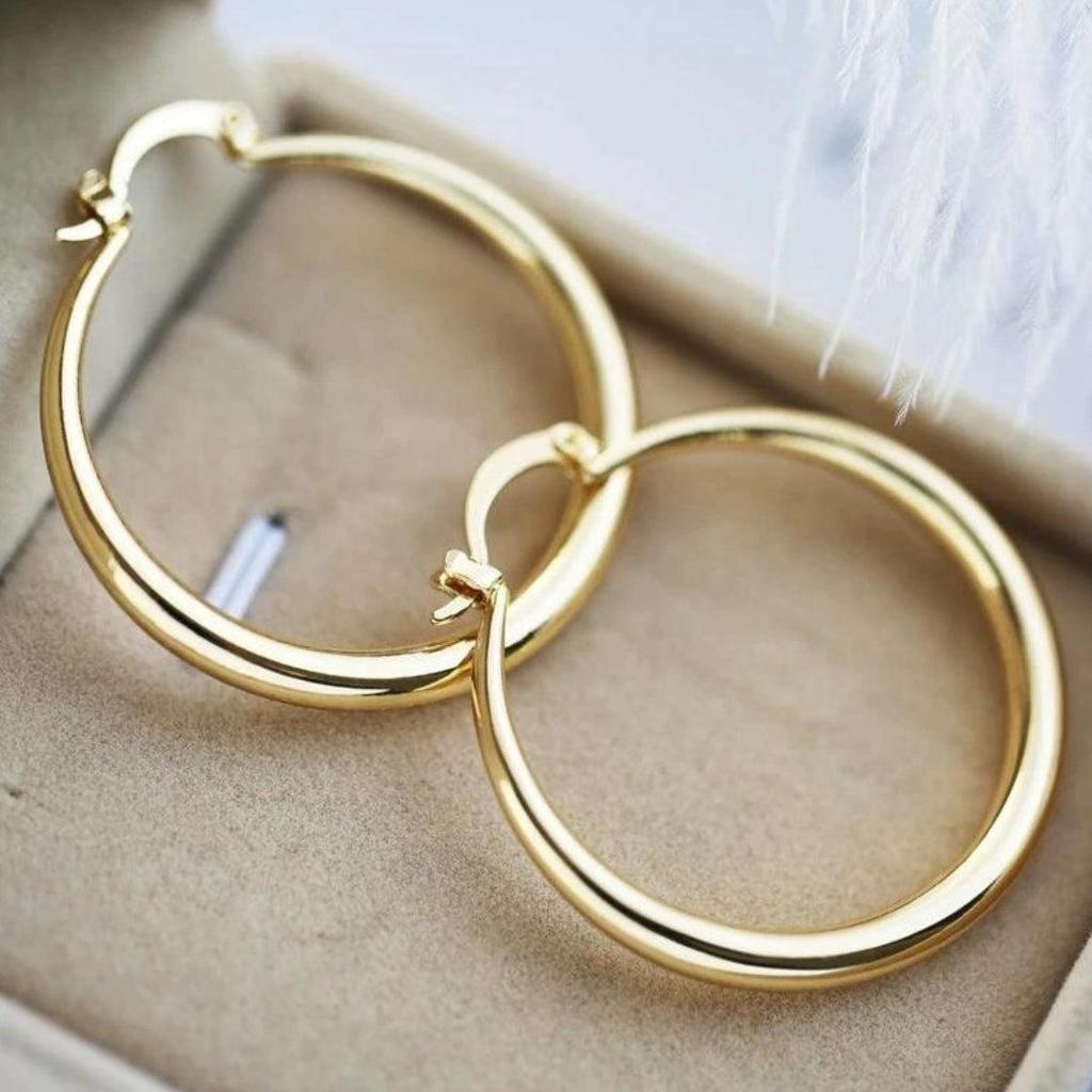 Grosse goldene Creolen