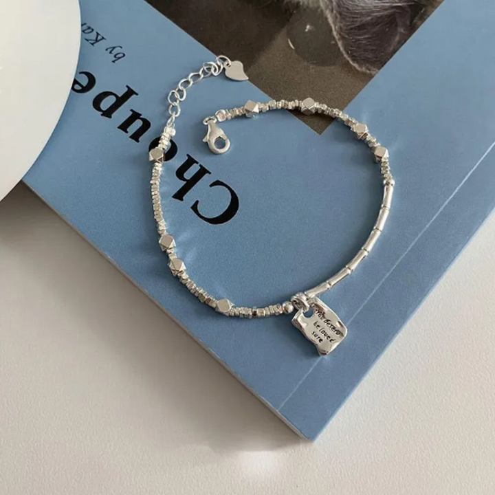 Quadratisches Weissgold-Armband „Liebe“