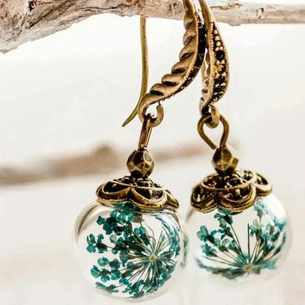 Retro-Blumenohrringe in antikem Gold