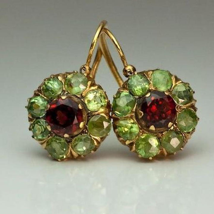 Retro runde Ohrringe mit grünen und roten Kristallen