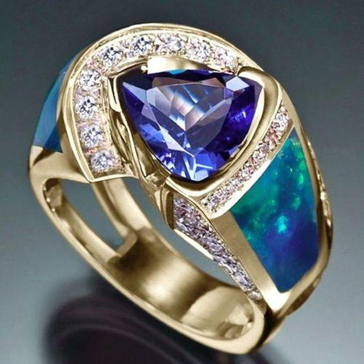 Rosa Ring mit kristallblauem Ozean-Motiv