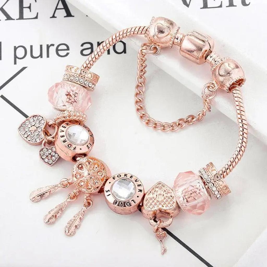 Rosa Traumfänger-Armband mit Weissgold-Anhängern
