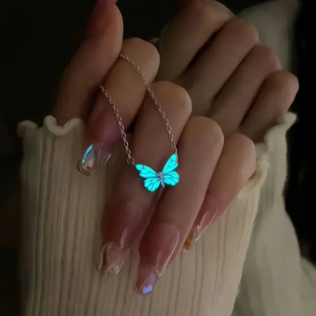 Set Halskette und Armband mit leuchtendem blauen Schmetterling