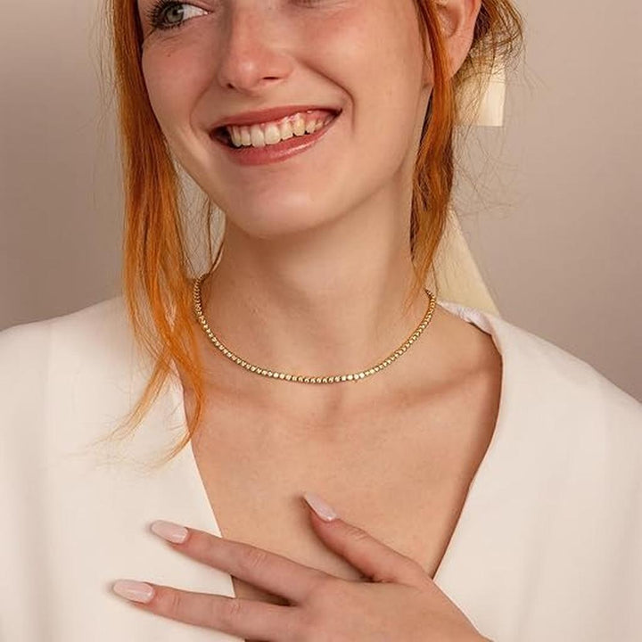 Tenniskette aus Gold