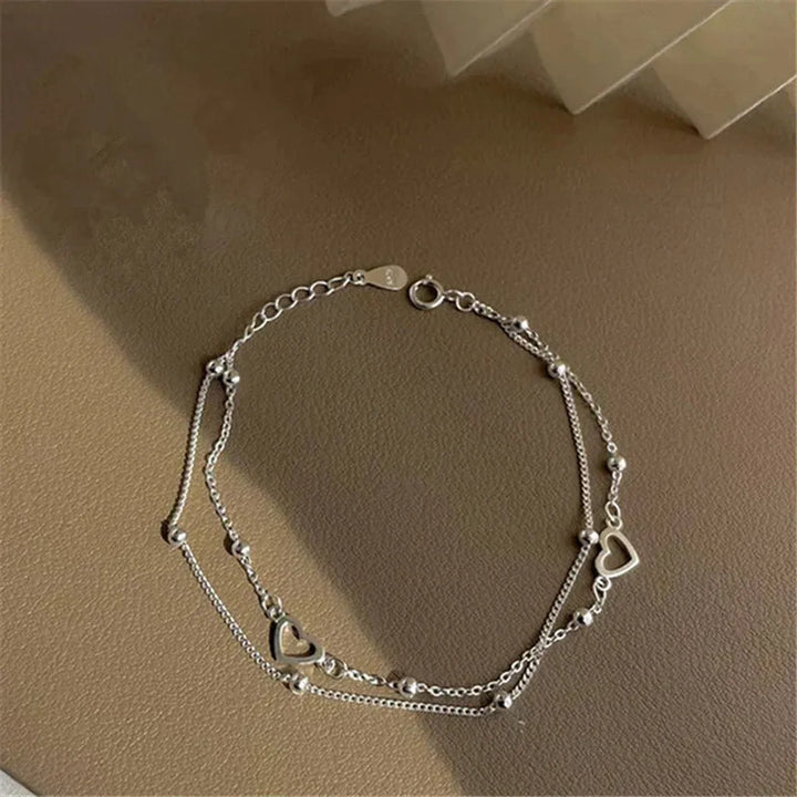 Verstellbares Armband mit Herz aus Weissgold