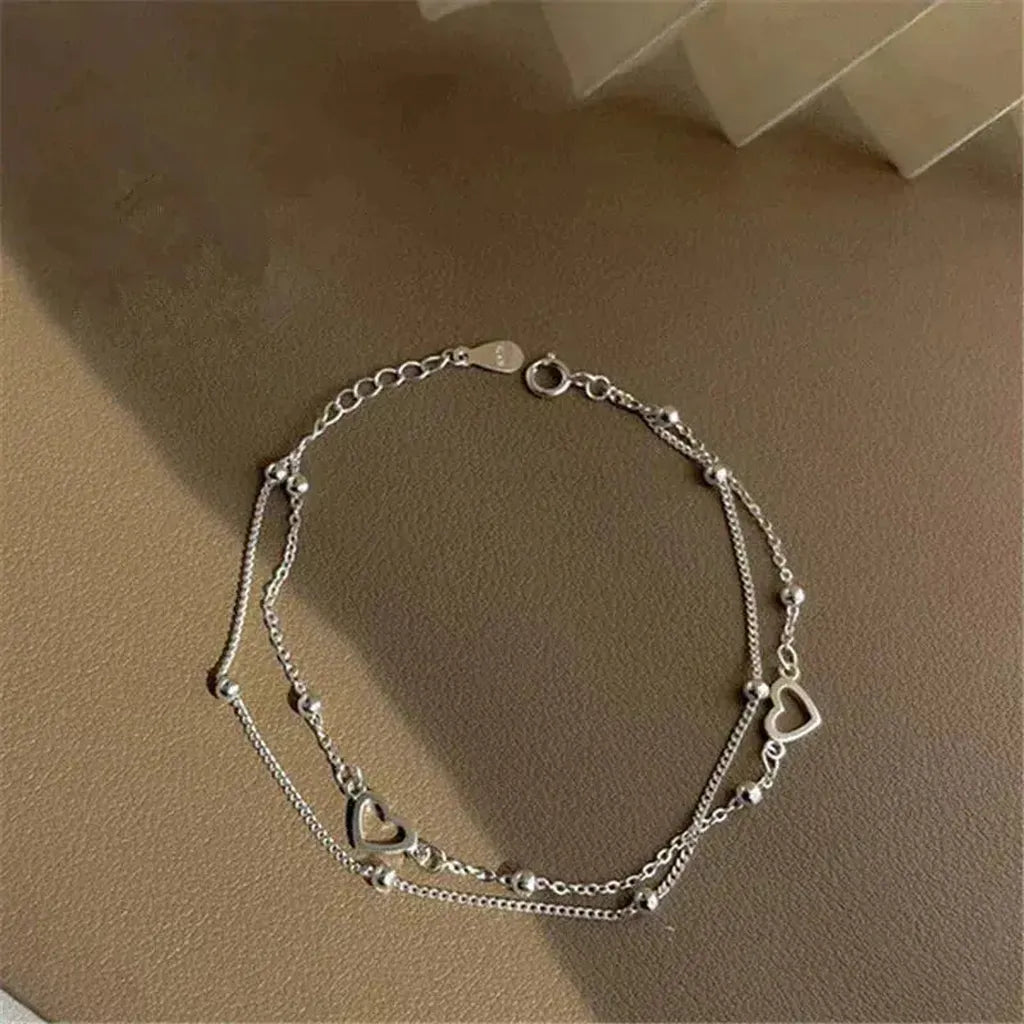 Verstellbares Weissgold-Armband mit Herz