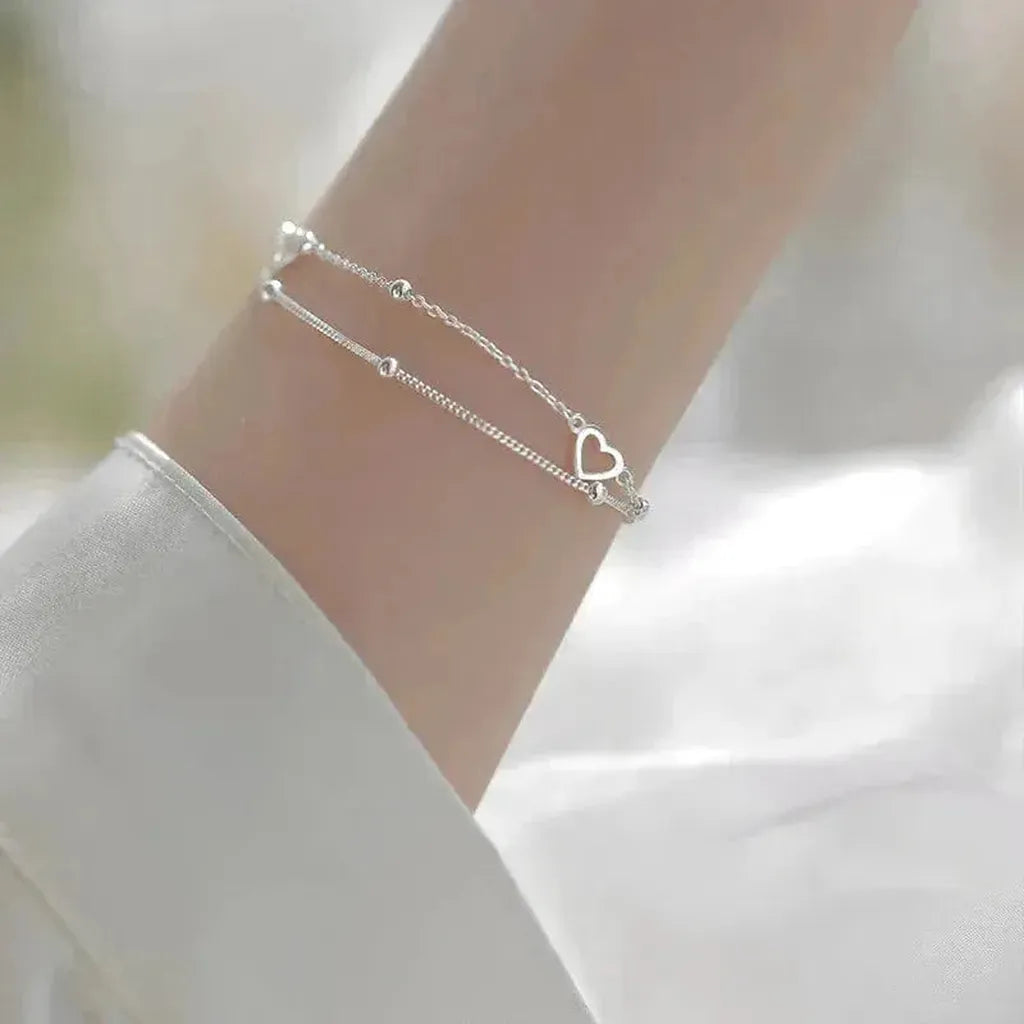 Verstellbares Weissgold-Armband mit Herz