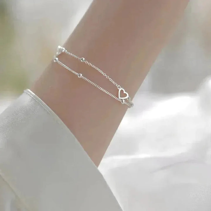 Verstellbares Weissgold-Armband mit Herz