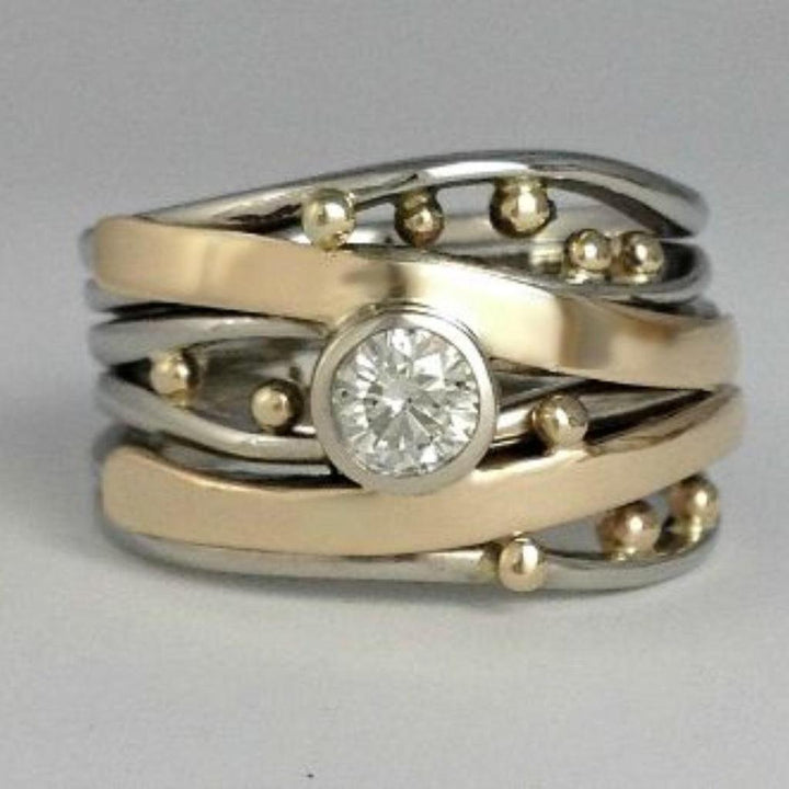 Vintage-Ring mit Brillanten- und Goldverzierungen