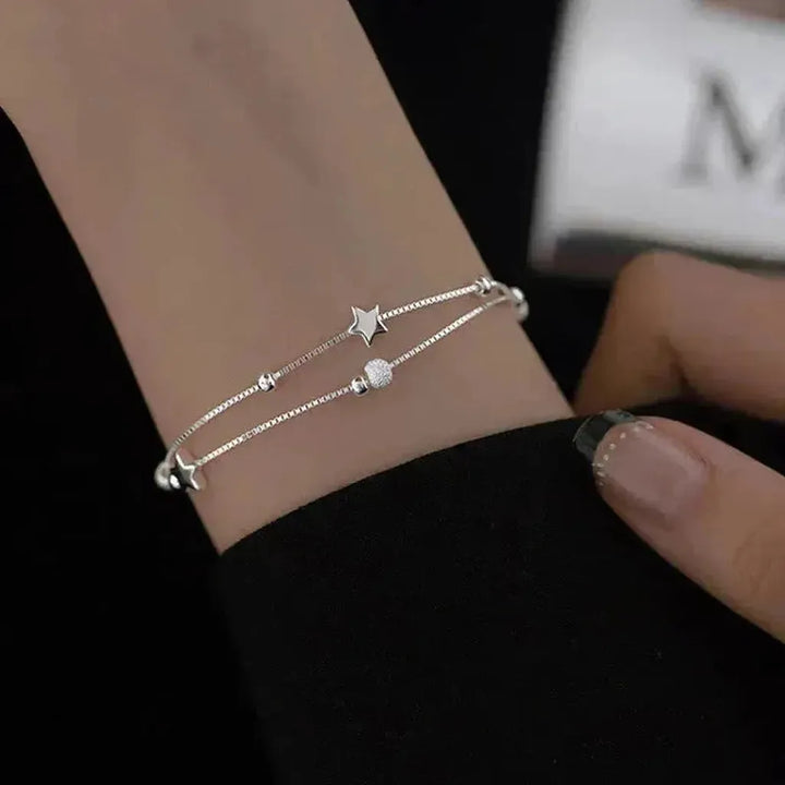 Weissgold-Armband mit Sternen