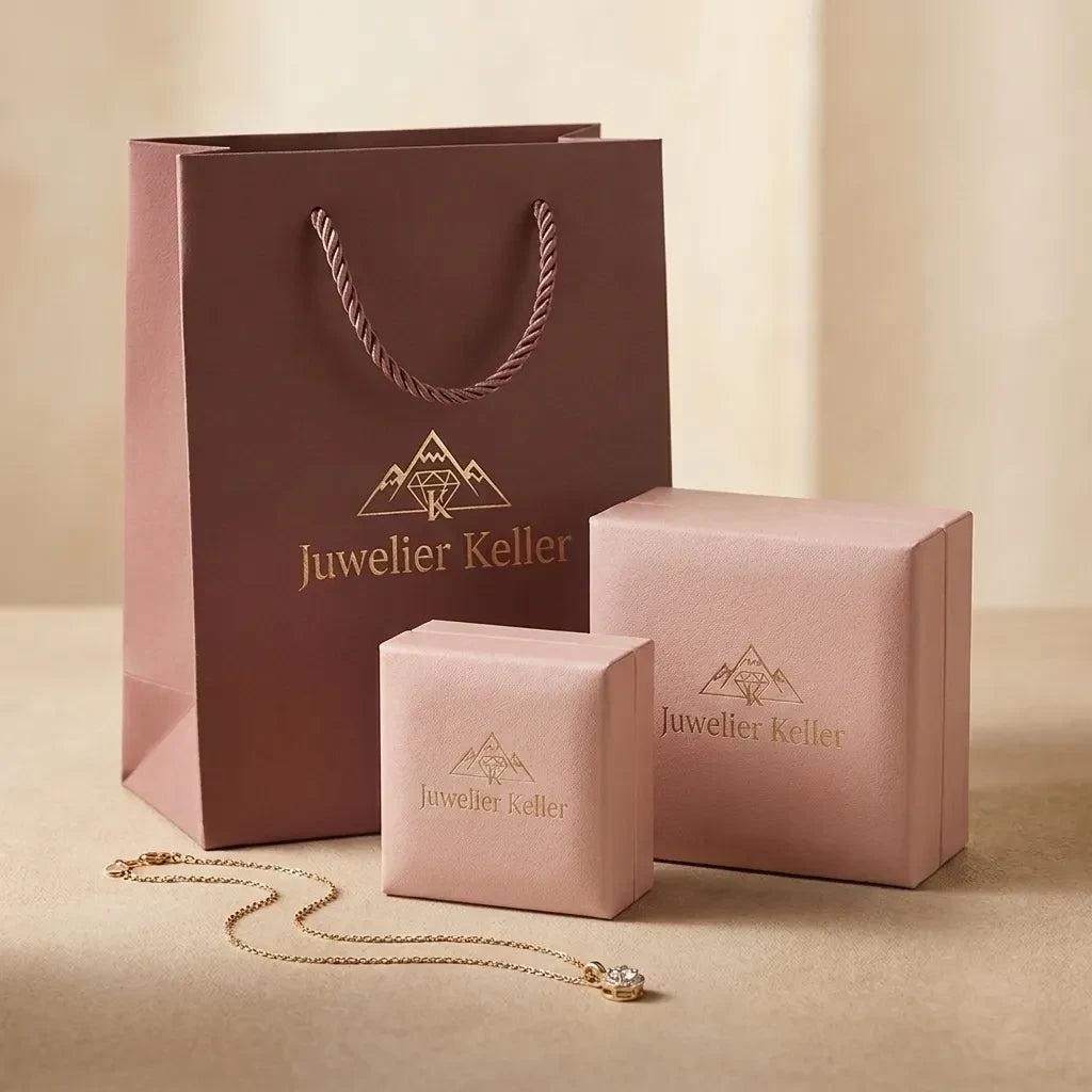 Embalagem de presente Juwelier Keller com saco e caixas rosa contendo um colar delicado com pingente de opala